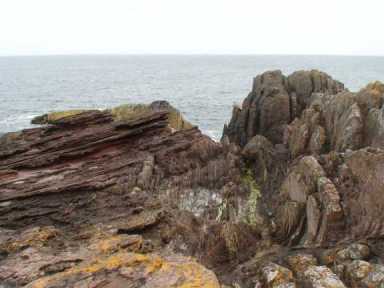 Unconformity between Old Red Sandstone and Silurian Greywacke, Siccar Point, Scotland.